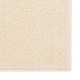 Teppe med kort luv 140×200 cm kremhvit